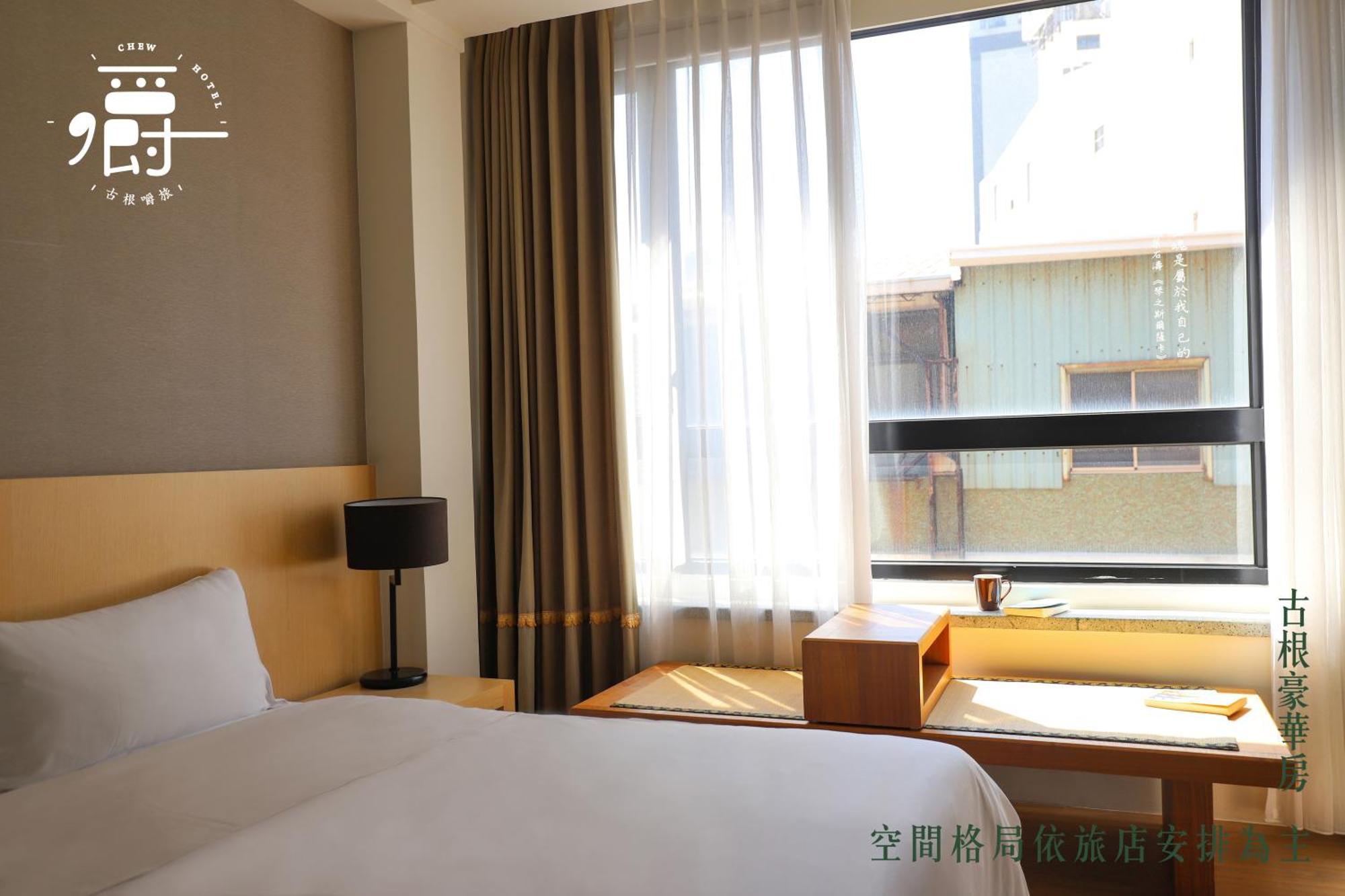 Roots Chew Hotel تاينان الغرفة الصورة